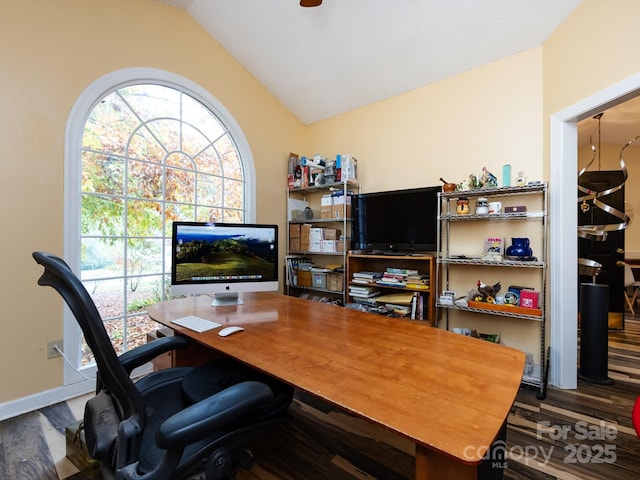 home office with hardwood / wood-style floors and vaulted ceiling