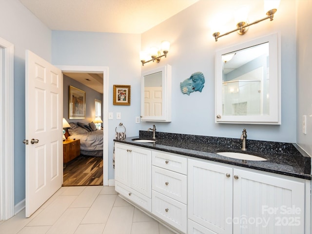 bathroom featuring vanity and tile patterned floors