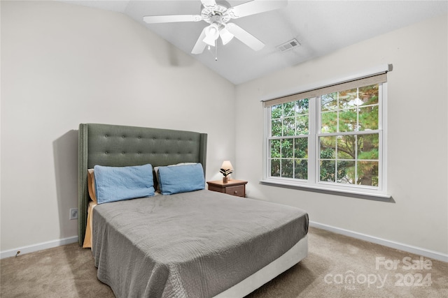 bedroom with carpet flooring, ceiling fan, and lofted ceiling