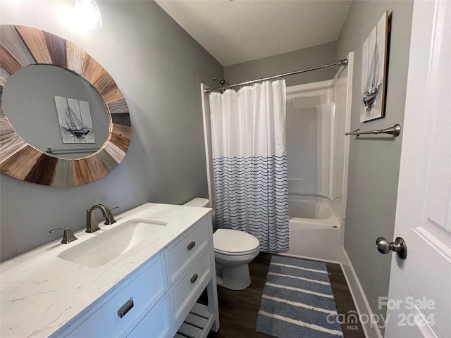 full bathroom featuring toilet, shower / tub combo with curtain, vanity, and hardwood / wood-style flooring