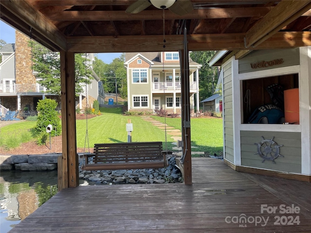 wooden deck with a yard