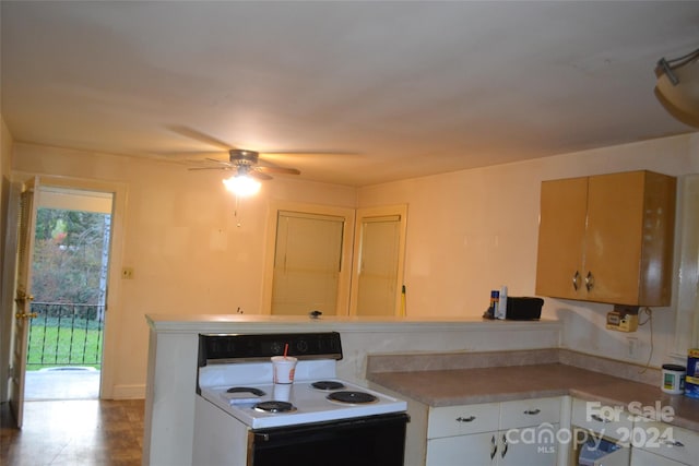 kitchen featuring white cabinets, white electric range, and ceiling fan