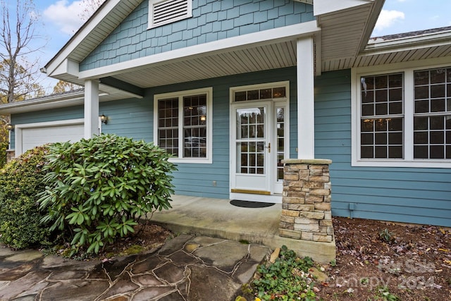 entrance to property with covered porch