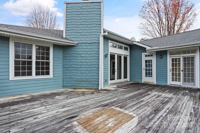 wooden deck featuring french doors