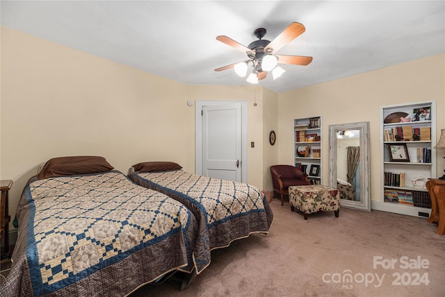 bedroom with ceiling fan and carpet floors