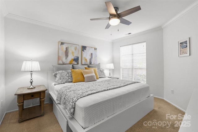 bedroom with ceiling fan, light colored carpet, and crown molding