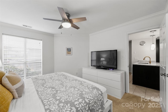 bedroom featuring sink, light tile patterned flooring, ceiling fan, and crown molding