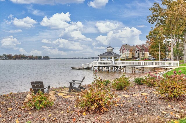 dock area featuring a gazebo and a water view