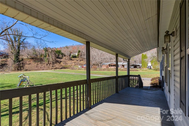 deck featuring a yard