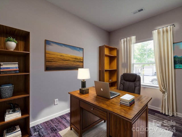 office area with dark hardwood / wood-style flooring