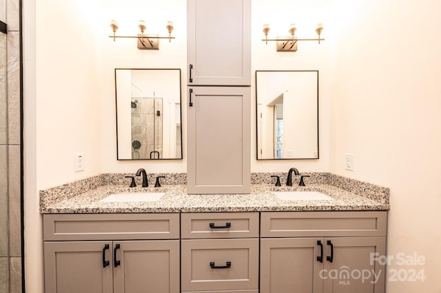 bathroom featuring vanity and walk in shower