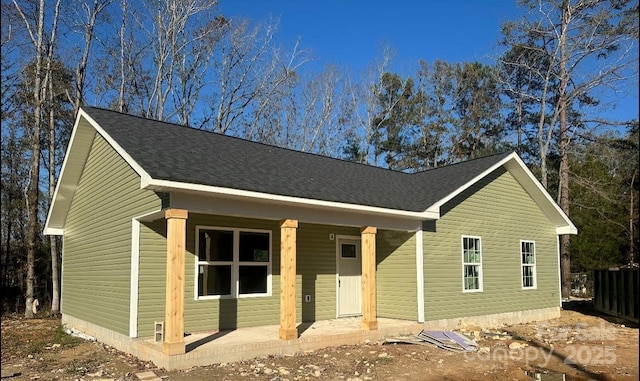 ranch-style house with covered porch