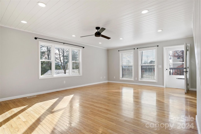 unfurnished room with ceiling fan, ornamental molding, and light hardwood / wood-style flooring