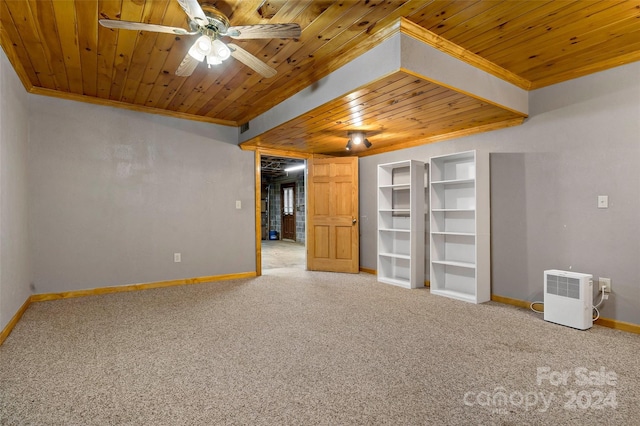 interior space with ceiling fan, wood ceiling, and ornamental molding