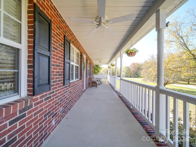 view of patio with a porch and ceiling fan