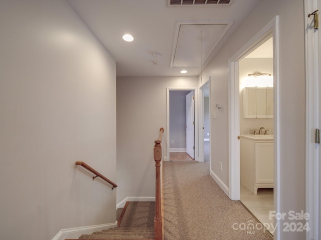 corridor with carpet floors