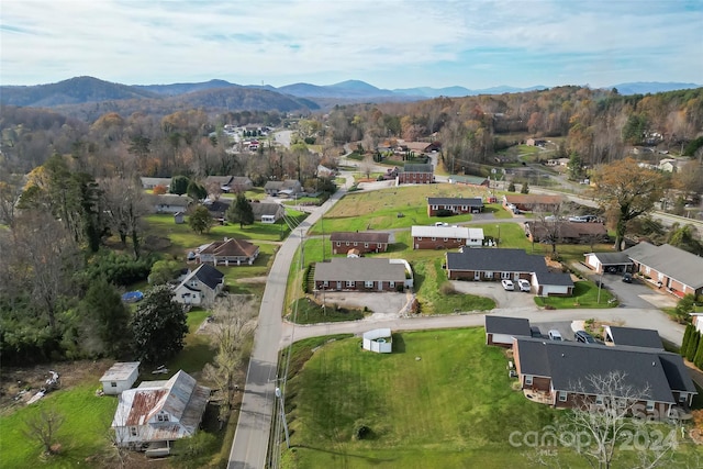 drone / aerial view featuring a mountain view