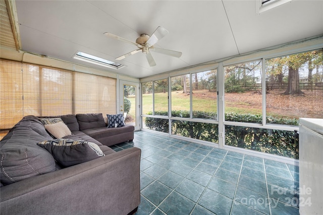 sunroom with ceiling fan and a healthy amount of sunlight