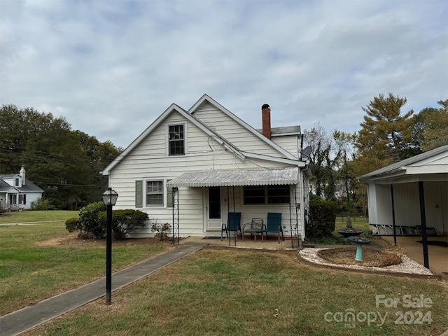 1716 3rd St NE, Hickory, NC 28601 - view of front of home featuring a front lawn