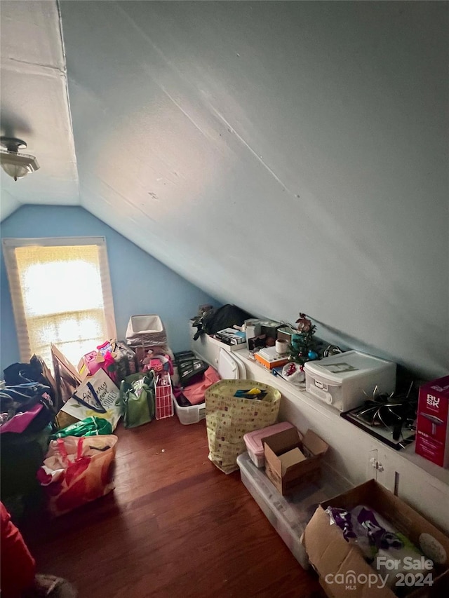 1716 3rd St NE, Hickory, NC 28601 - additional living space featuring vaulted ceiling and dark hardwood / wood-style floors
