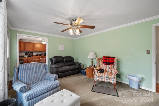 living room with carpet flooring, ceiling fan, and crown molding