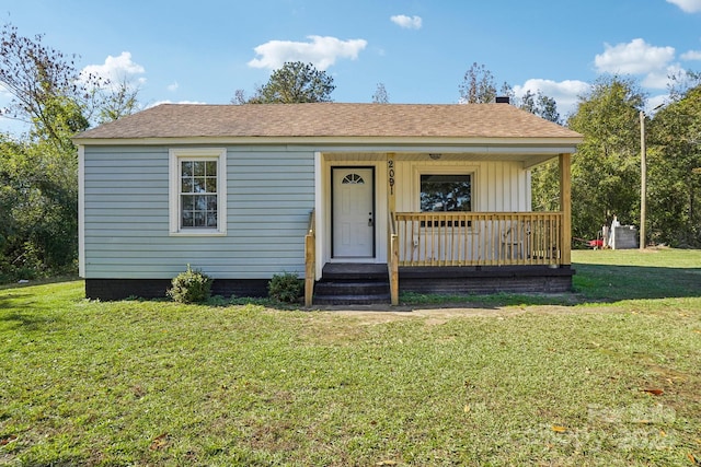 bungalow-style house with covered porch and a front lawn