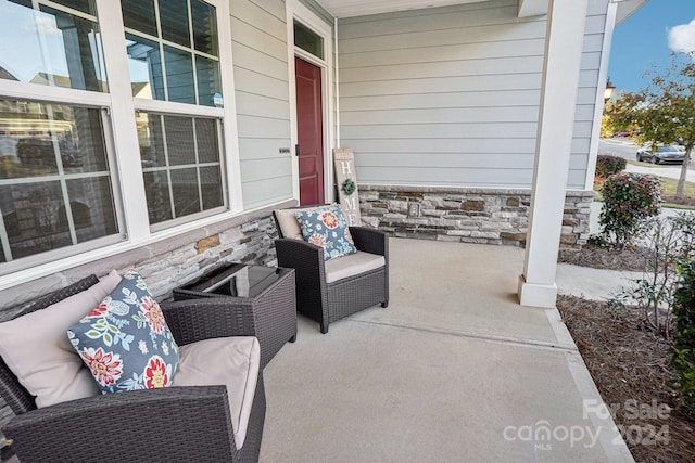 view of patio featuring covered porch