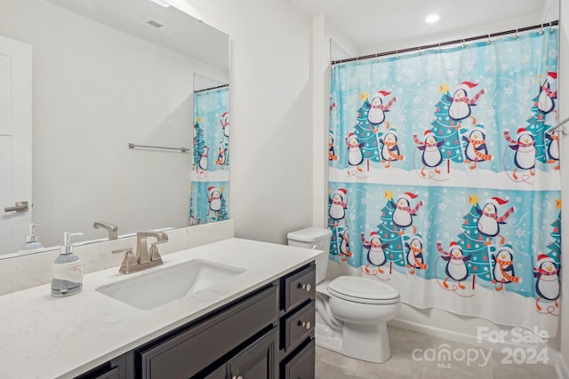 full bathroom featuring tile patterned flooring, vanity, shower / bath combination with curtain, and toilet