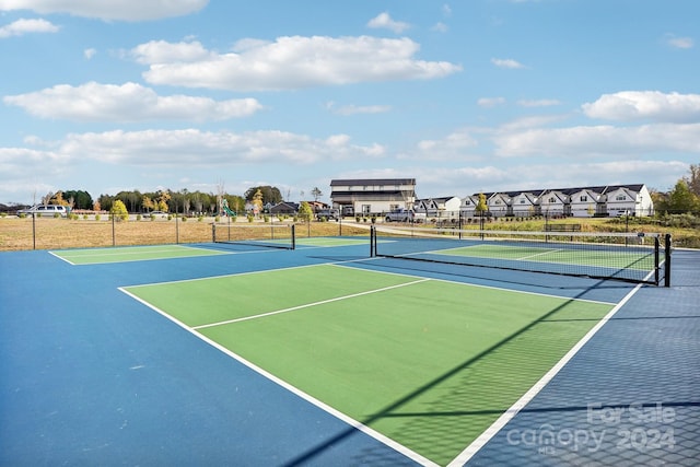 view of tennis court with basketball court