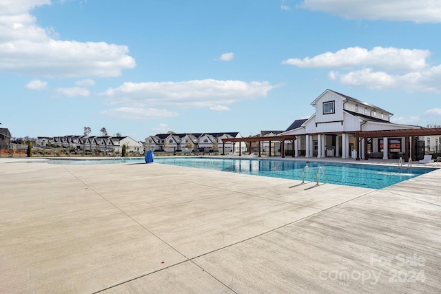 view of pool featuring a patio