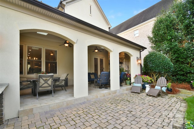 view of patio / terrace featuring ceiling fan