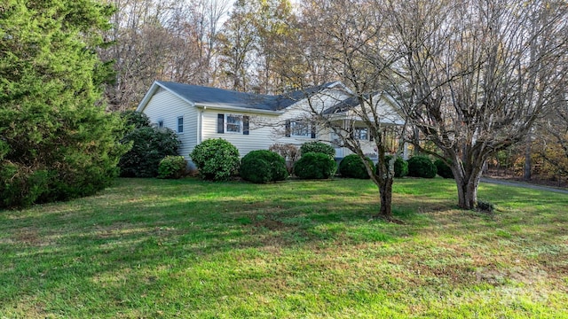 exterior space featuring a front lawn