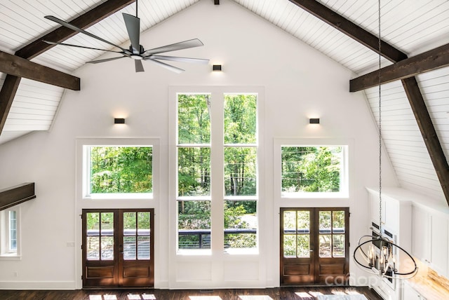 living room featuring french doors, high vaulted ceiling, and beamed ceiling