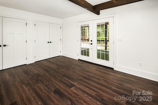 interior space featuring french doors, beamed ceiling, dark wood finished floors, and access to outside