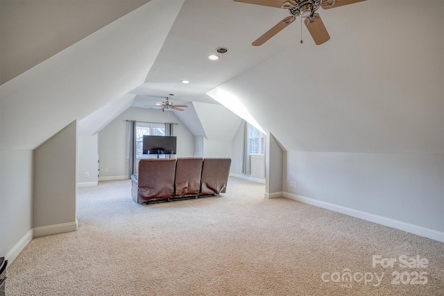 interior space featuring vaulted ceiling and carpet