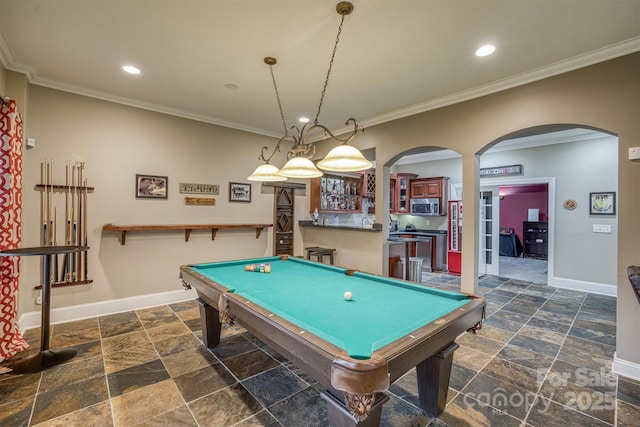 rec room featuring billiards and ornamental molding