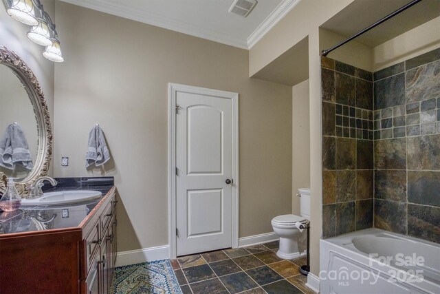 full bathroom with ornamental molding, vanity, toilet, and tiled shower / bath