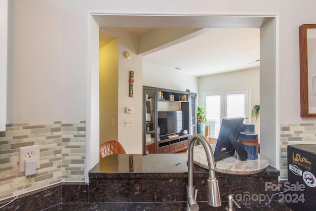 kitchen with dark stone counters