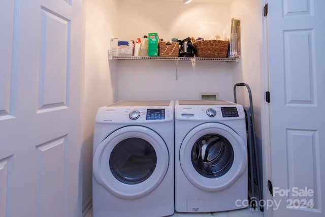 washroom with independent washer and dryer