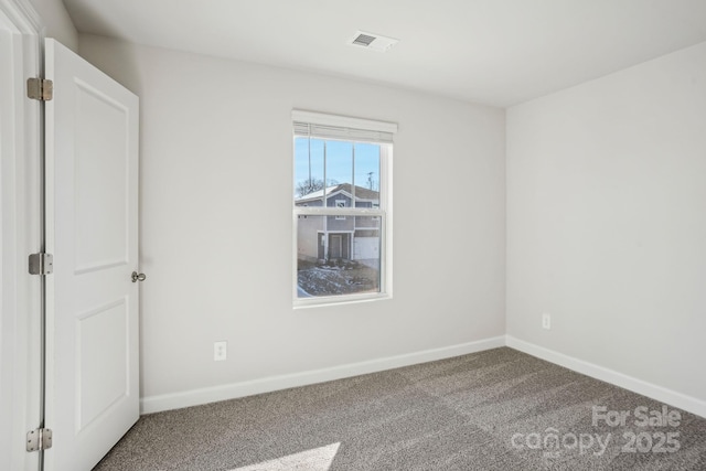 view of carpeted spare room