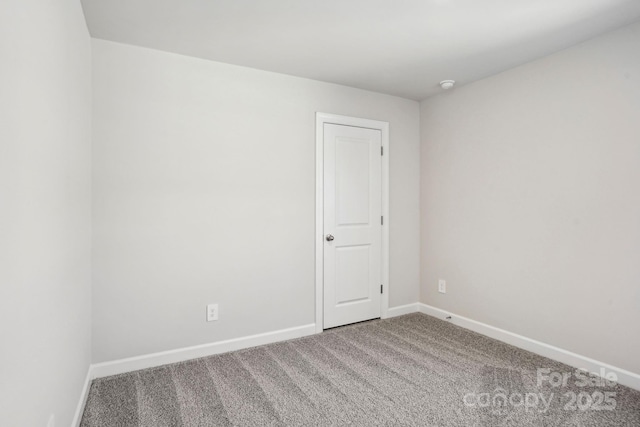 unfurnished room featuring carpet floors