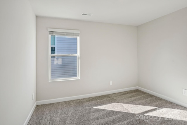 view of carpeted spare room