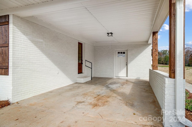 view of patio featuring a carport