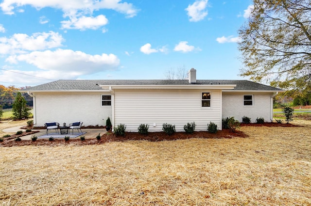 back of house featuring a patio