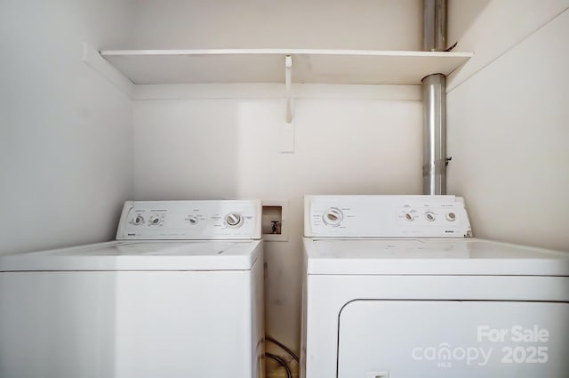 washroom with washer and clothes dryer