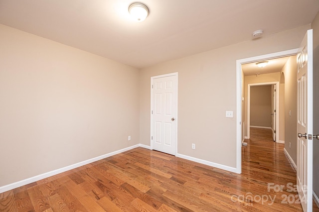 unfurnished bedroom featuring wood-type flooring