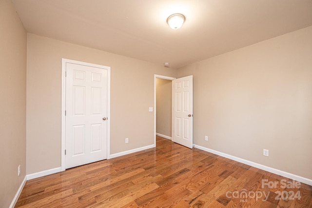 unfurnished bedroom with light hardwood / wood-style flooring