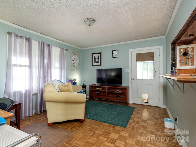 living room with parquet flooring, a textured ceiling, and crown molding