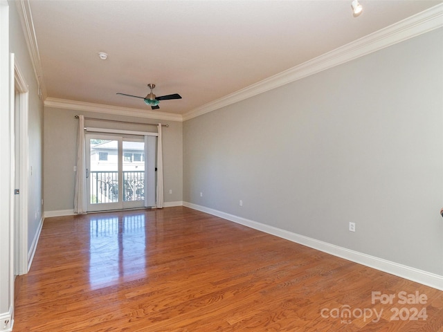 unfurnished room featuring crown molding, hardwood / wood-style floors, and ceiling fan