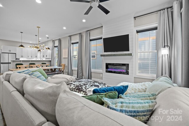 living room featuring ceiling fan